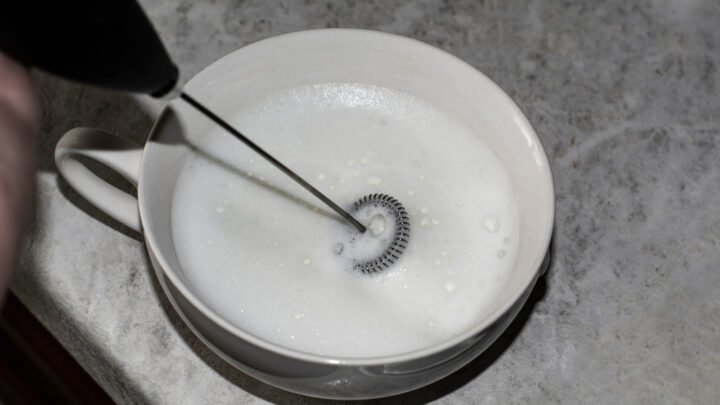 How to make a caramel latte. Froth milk using handheld milk frother.
