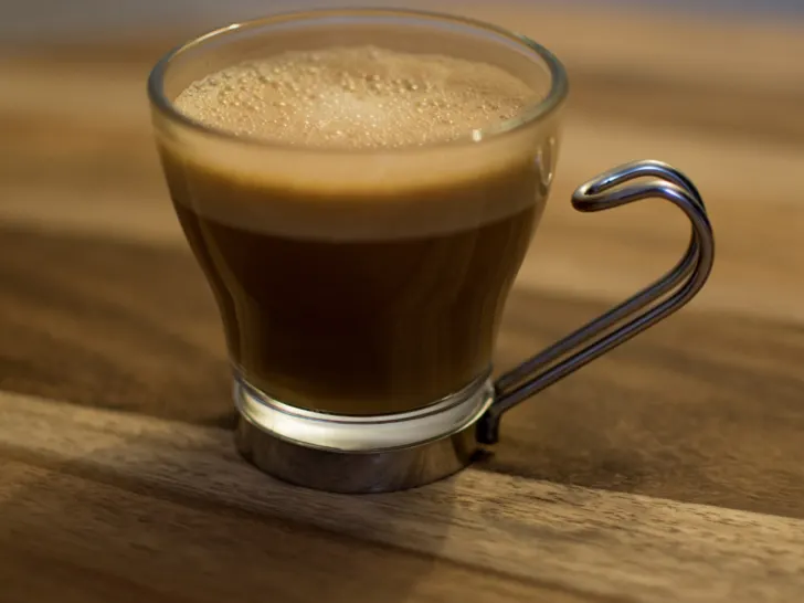 Picture of a cortado. 
Cortado vs Latte: Which One is Right For You?