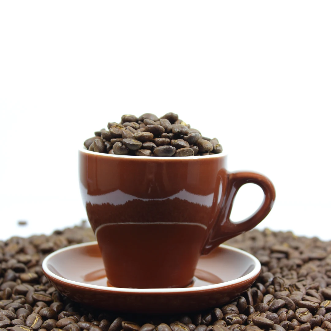 Image of coffee cup filled with dark roast coffee beans. Discover the Best Dark Roast Coffee – and Why You Should Try It