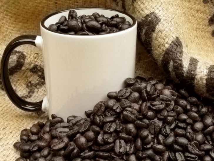 Picture of coffee mug filled with dark roast coffee beans. Discover the Best Dark Roast Coffee – and Why You Should Try It
