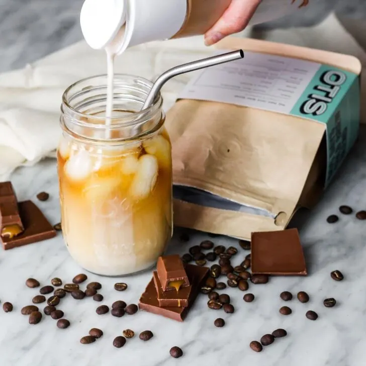 Picture of person pouring creamer into a mason jar. Can you froth creamer?
