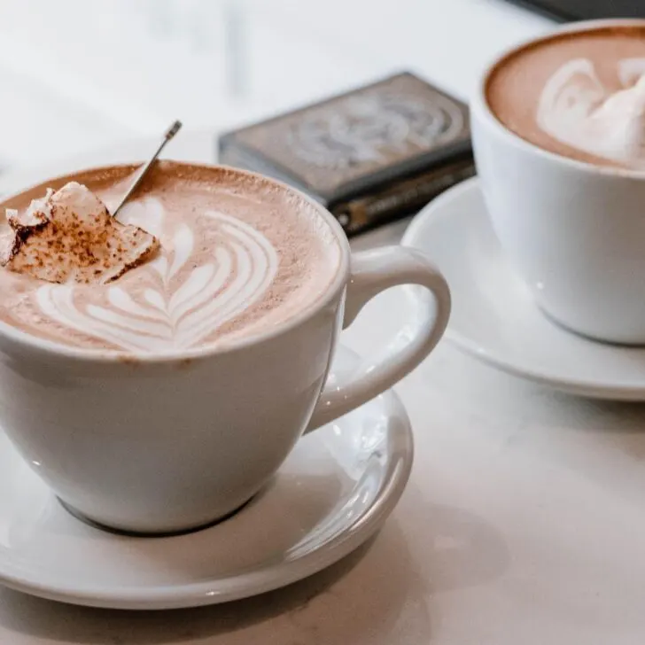 Picture of cup of coffee with frothy creamer. Can you froth creamer?