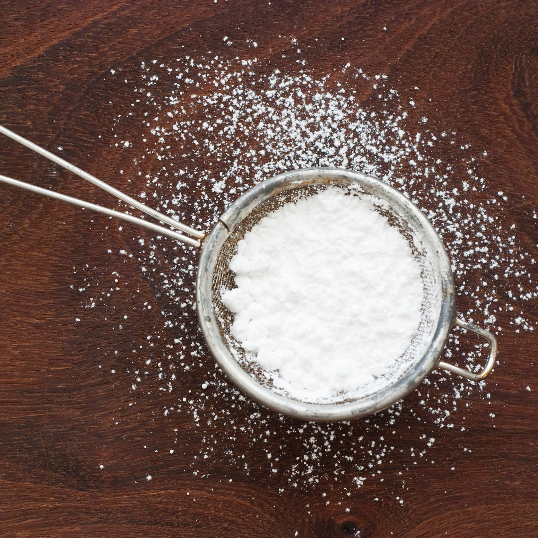 Image of powdered sugar. Powder sugar in coffee